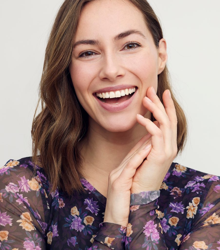 female model looking happy